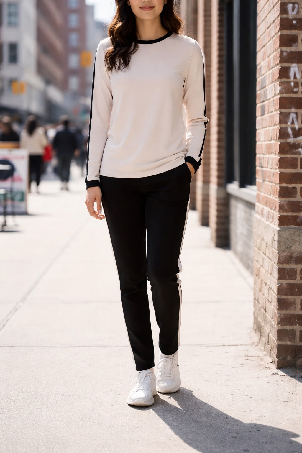 Off white with black pipen full sleeves panel T shirt with black panel trousers For her